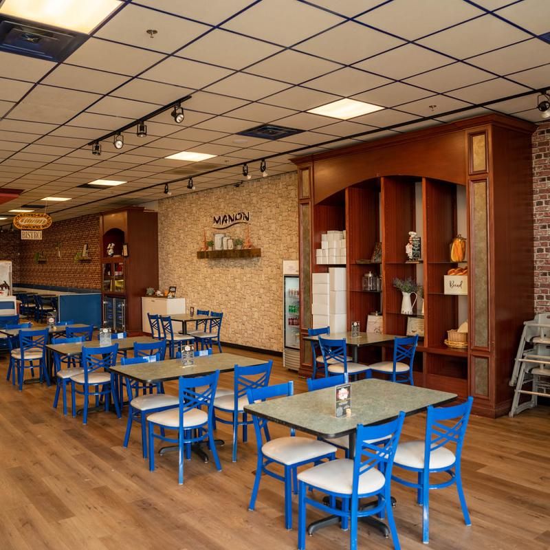 A Bistro Menu Hiding Behind The Bakery Counter