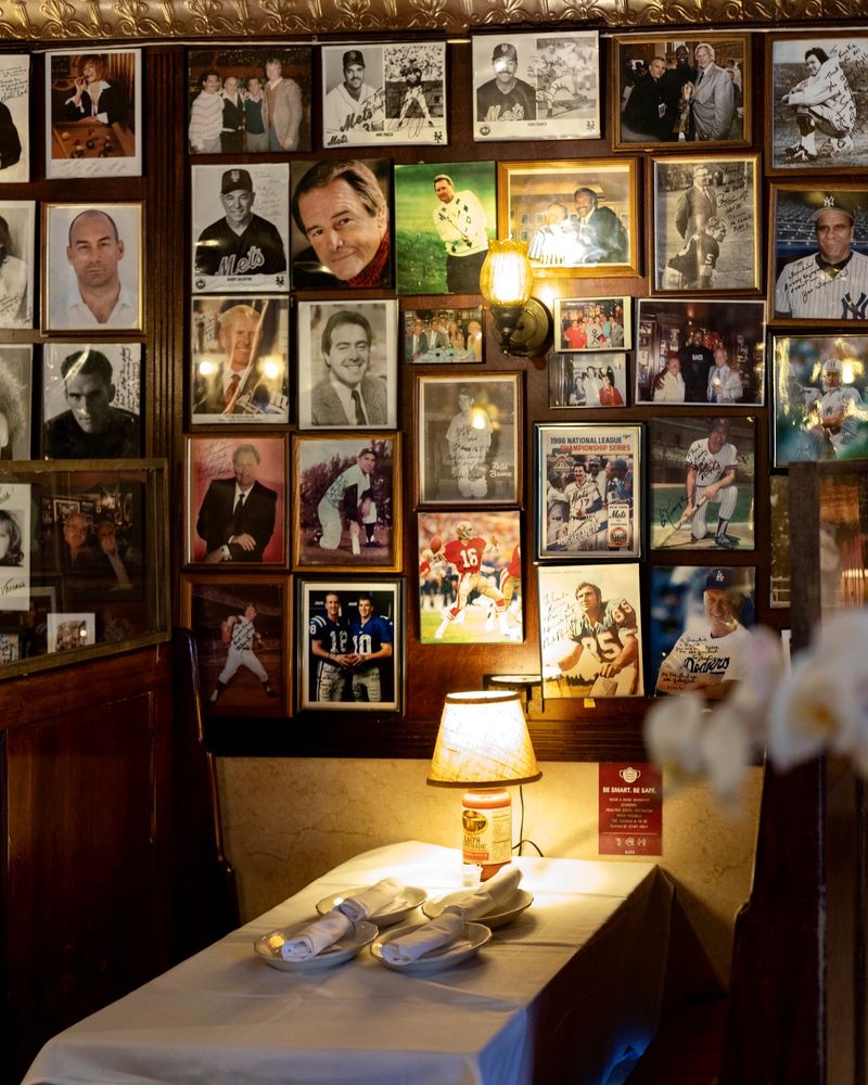 Walls Covered In Framed Photographs