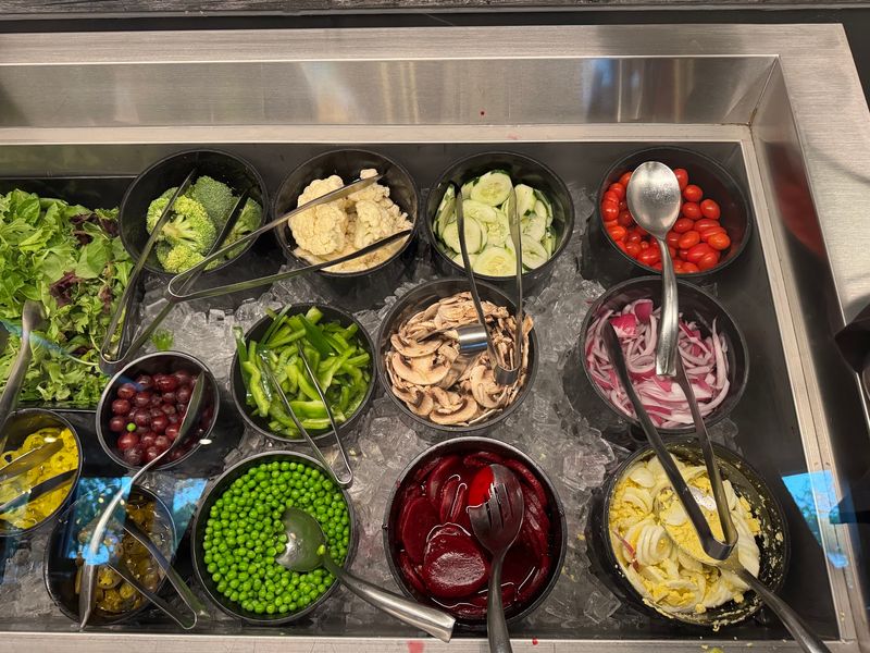A Salad Bar With Over 50 Options That Comes With Every Entree