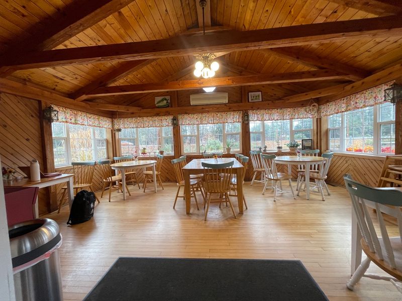 Cozy Indoor Seating And Shady Picnic Tables