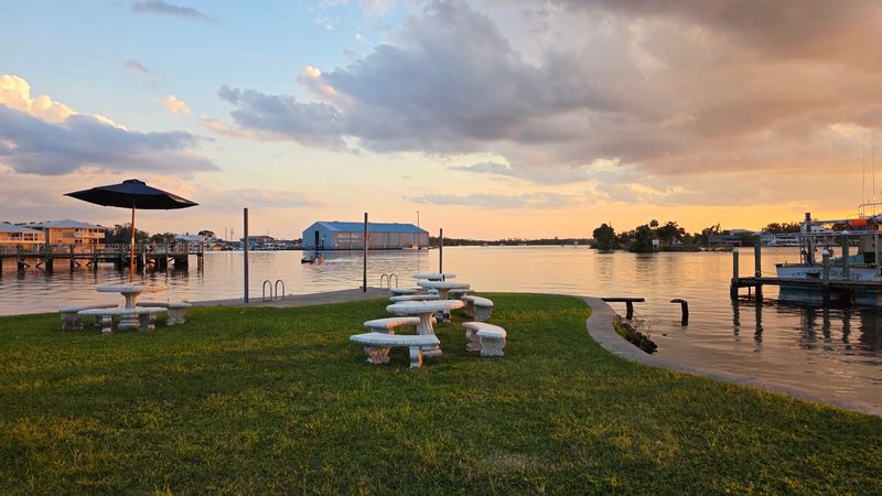 Outdoor Seating With Cornhole And Connect Four