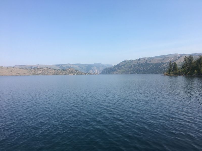 Afternoon Winds Send Sailboats Gliding Over The Lake