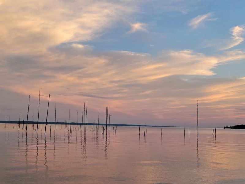 Calming Sunsets Over The Water Horizon