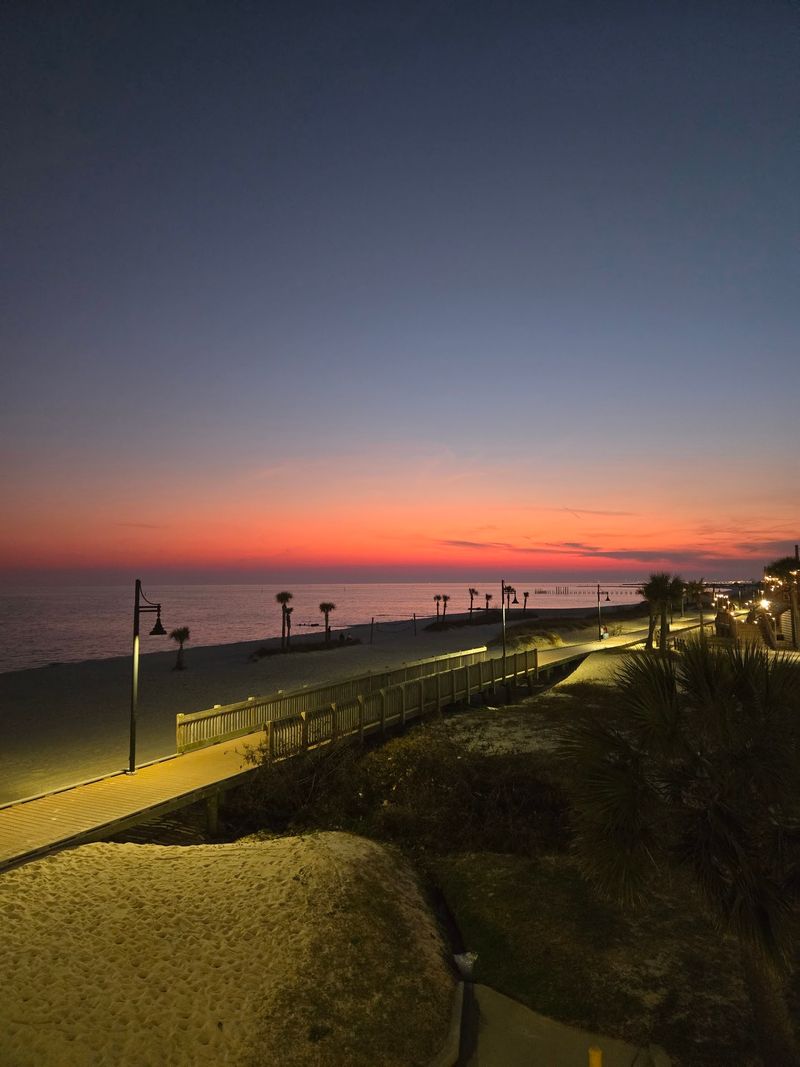 Sunset Strolls Along The Boardwalk After Dinner