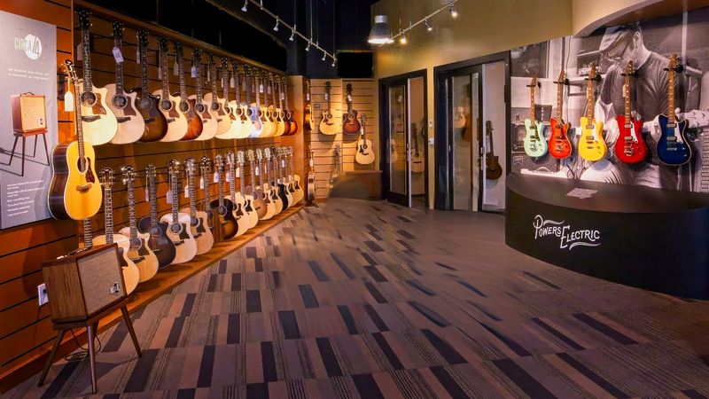 The Showroom Where Guitars Hang Waiting To Be Played