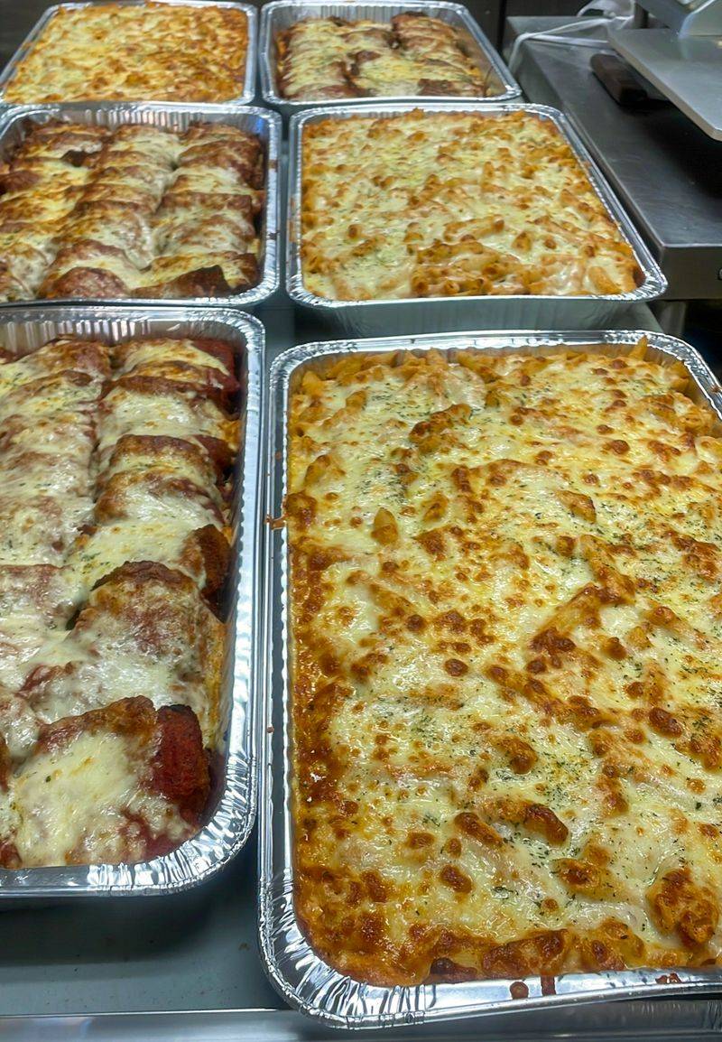 Heroes, Pasta, And Plates That Fill A Table