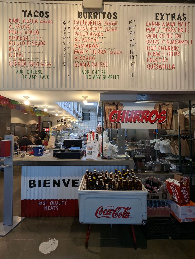 The Crew Behind The Counter Keeps Things Moving