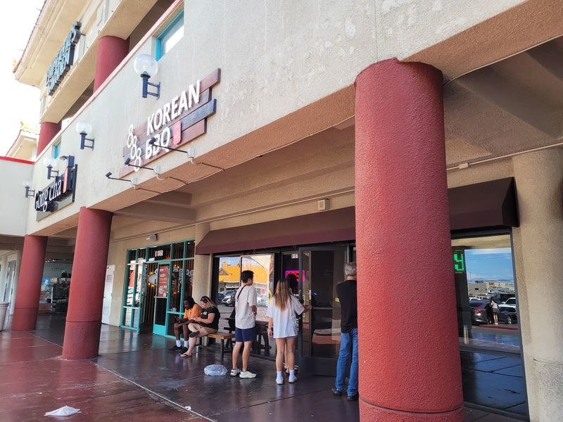 A Strip Mall Doorway With A Busy Buzz