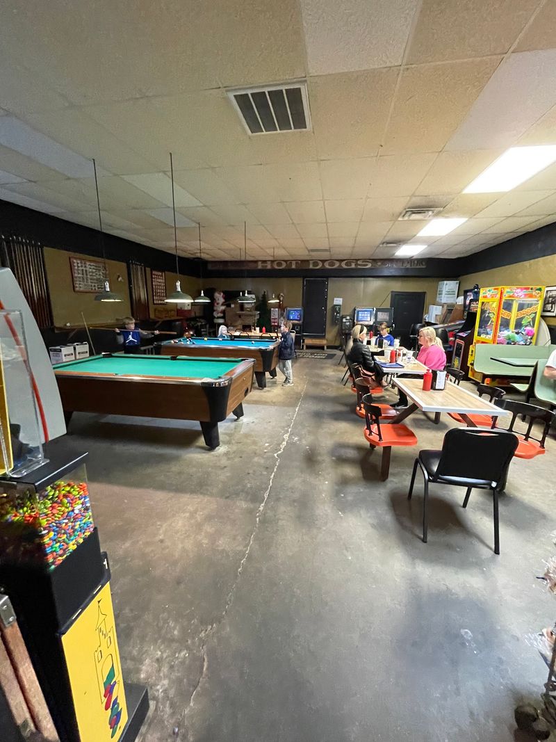 Pool Tables And Pinball In The Back Room