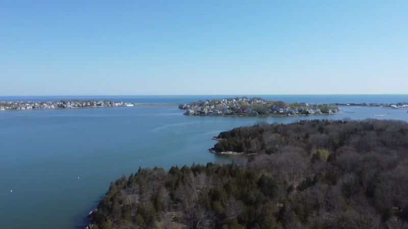 Vistas Across The Water To A Distant Cityscape