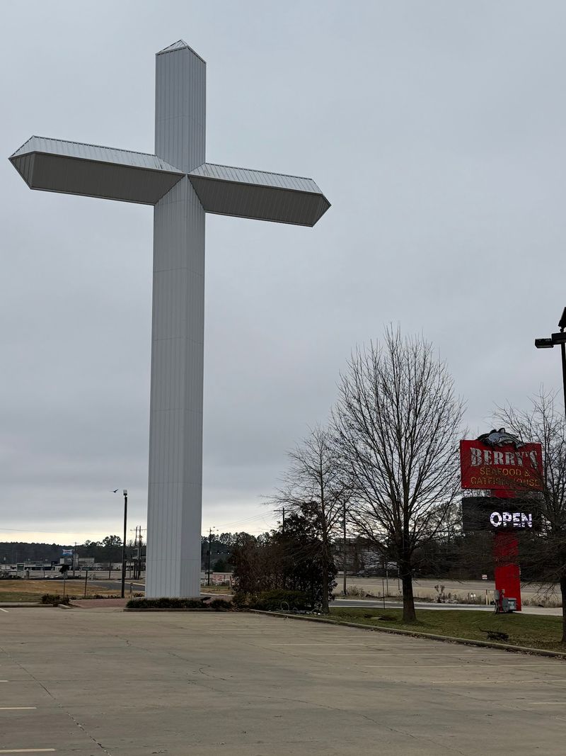 A Barn On The Highway With A Cross You Can See For Miles