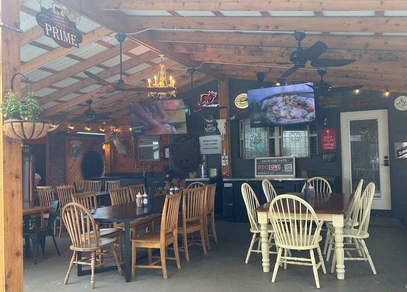 Casual Seating Inside And A Shaded Patio Outside