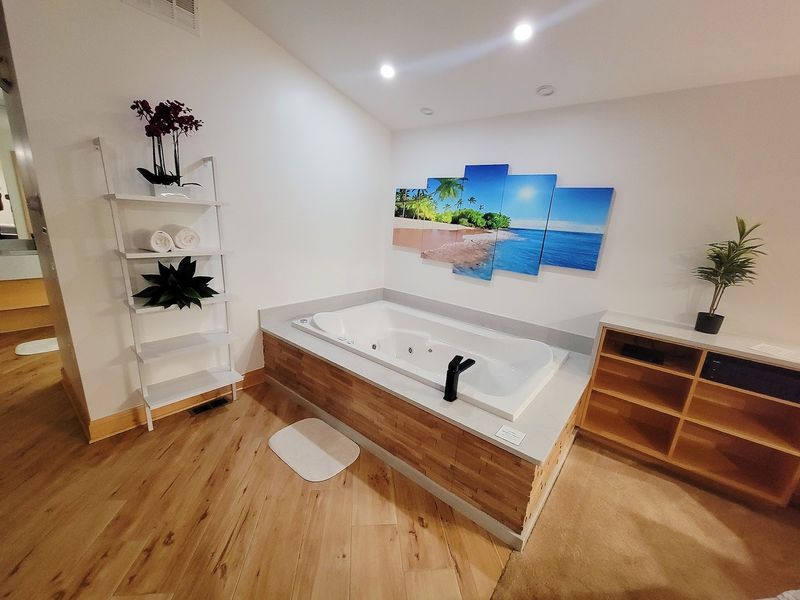 A Private Whirlpool Tub Right Inside The Suite