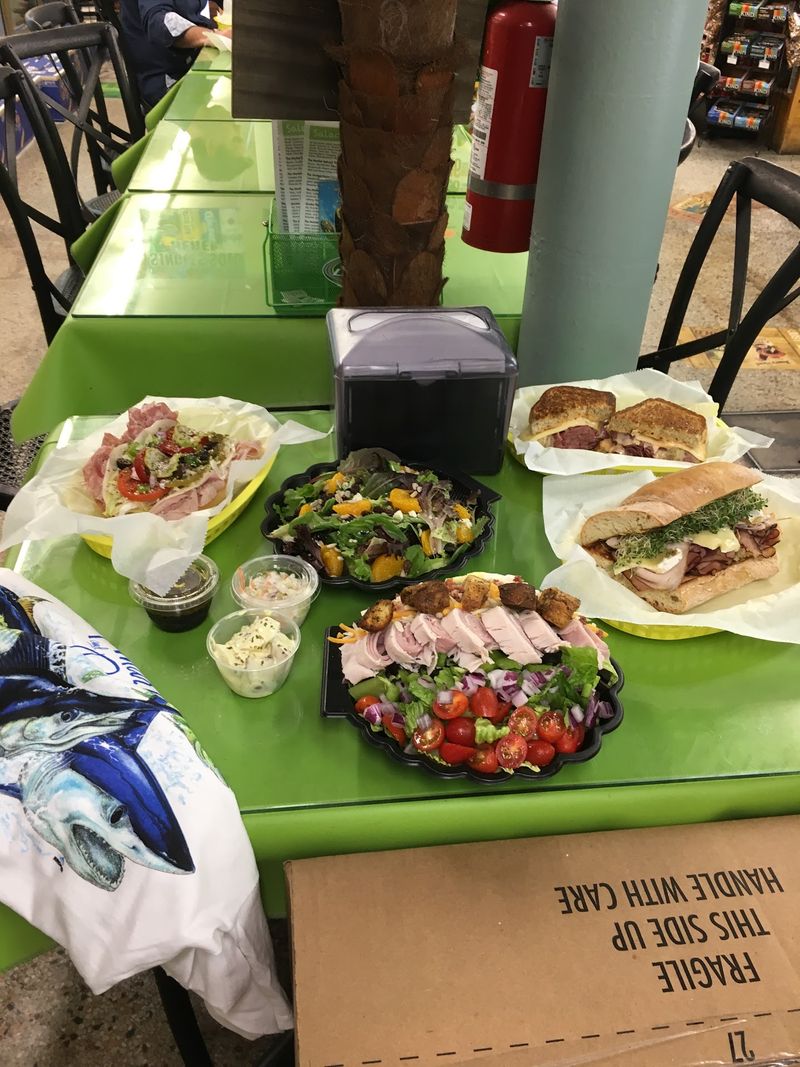 A Corner Store With A Sandwich Counter Hiding In Back