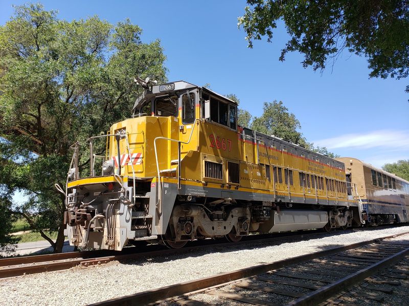 A Working Rail Line With Restored Vintage Cars