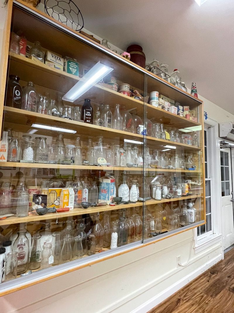 Milk Bottles And Antiques Fill The Country Store