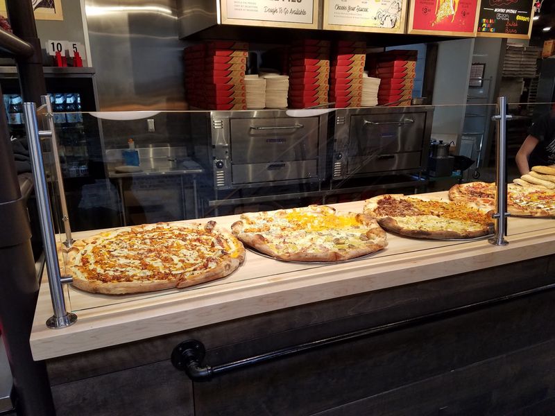 Pizza, Coffee, And Ice Cream Under Old Steel Beams