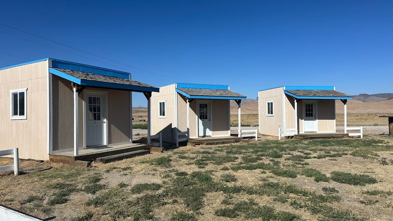 Cabins, Rooms, And Rigs Under Big Skies