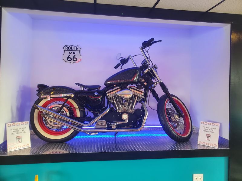 Nostalgic Decor With A Harley In The Mix