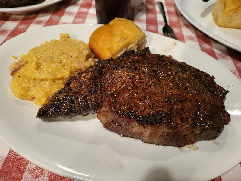 Hand-Cut Ribeyes Over Oak Charcoal