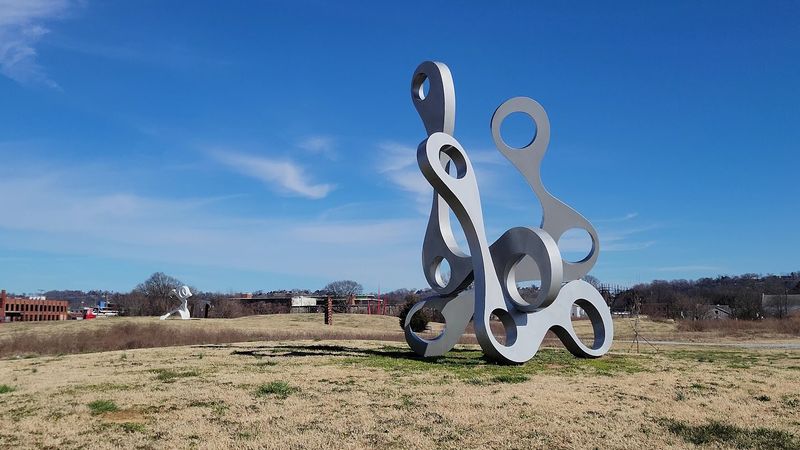 Fifty Giants Standing In The Grass