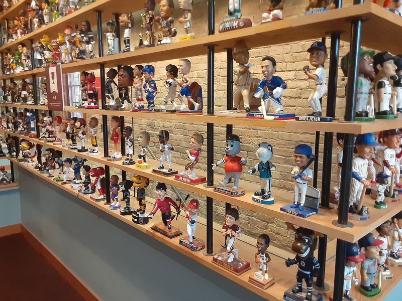 Sports Heroes Nodding From Every Shelf