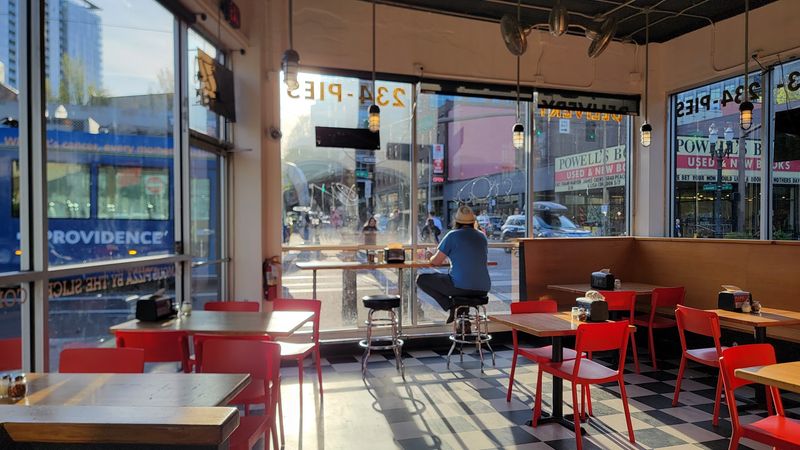 A Rock-And-Roll Pizza Counter With Downtown Swagger