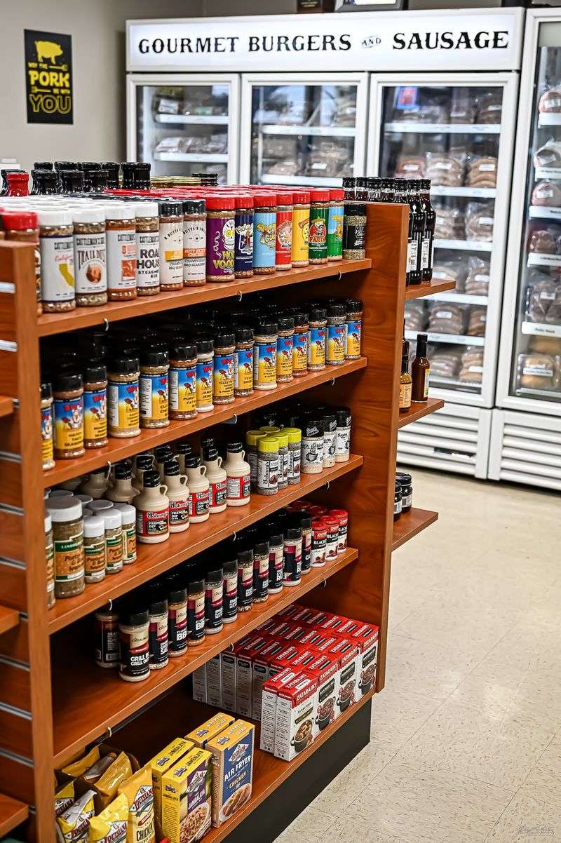Shelves Stocked With Rubs, Sauces And Pantry Treats