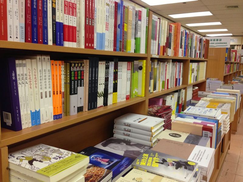 Shelves Stacked With Mandarin And Cantonese Reads