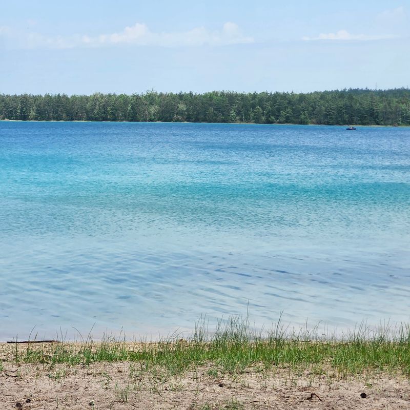 Paddling On Glass-Clear Water