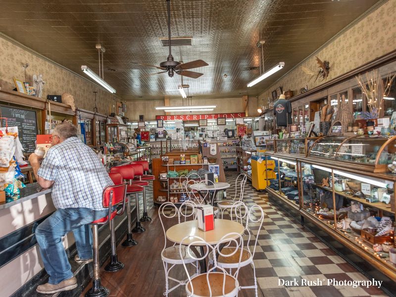 Checkered Floors And Cherry Red Stools