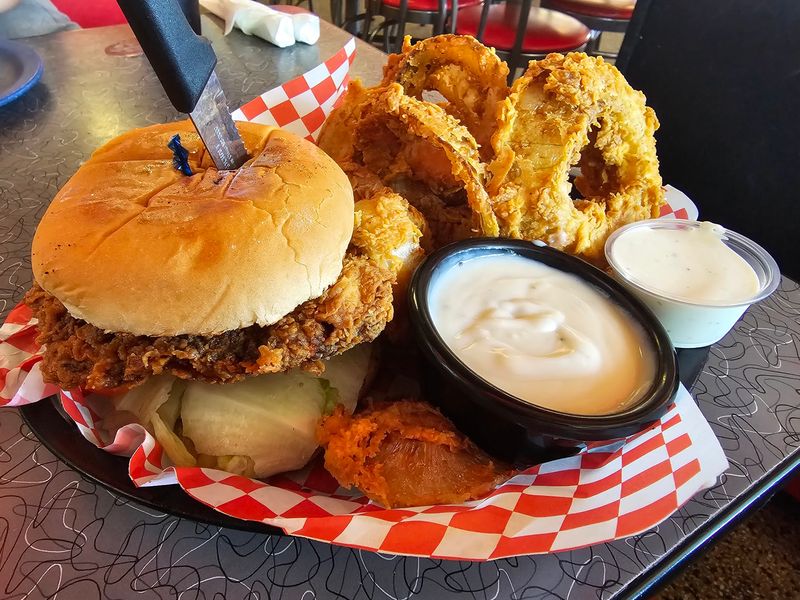 Chicken Fried Steak With A Bowl Of Gravy On The Side