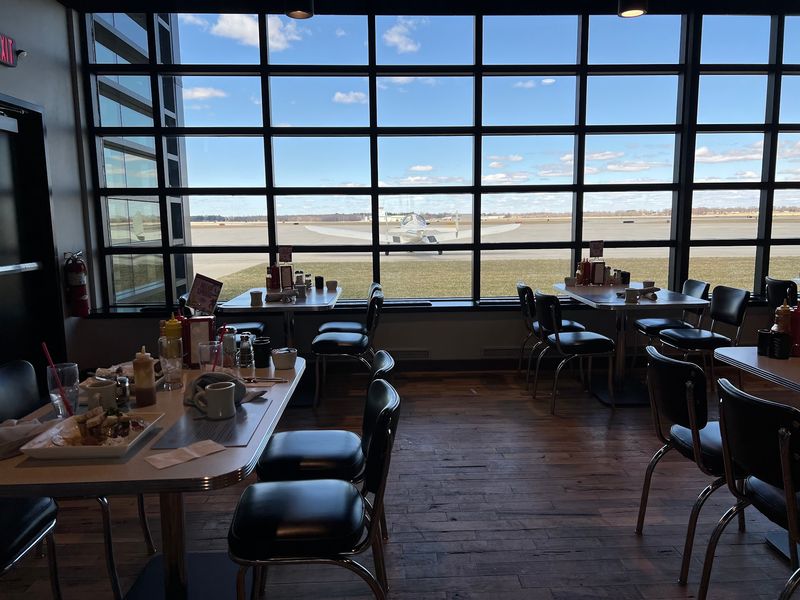 Counter Stools, Open Tables, And An Easygoing Room