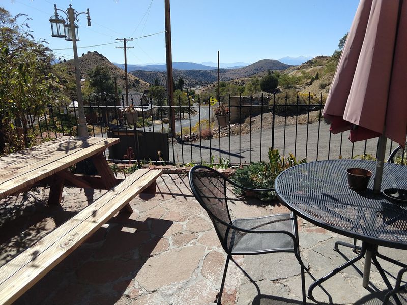 Porch Seating With Mountain Views You Will Not Rush