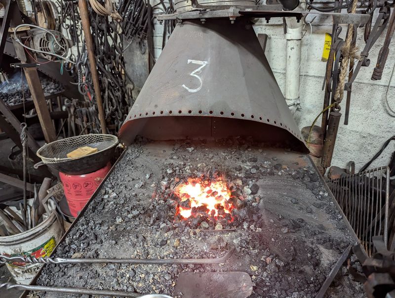 Coal Fire, Anvil, And Tongs