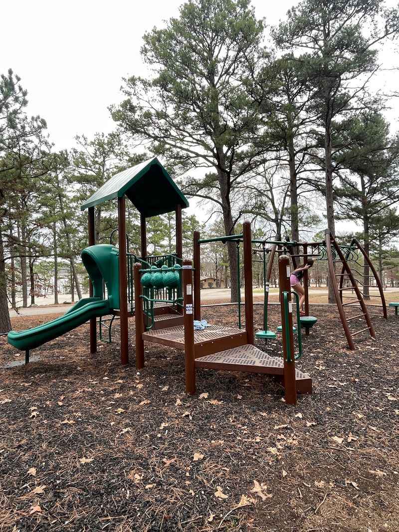Swimming Beach And Playground Fun