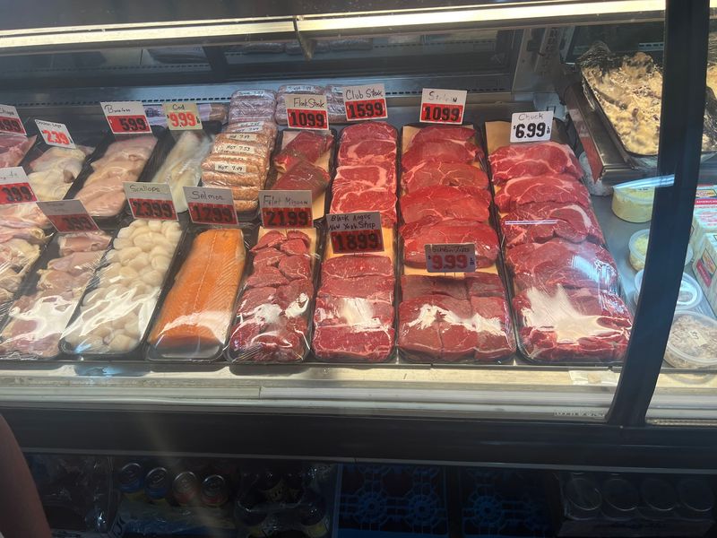 A Full Butcher Counter With Hand-Cut Steaks