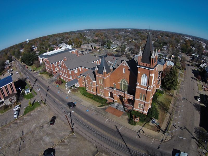 Parking, Hours, and What the Old Buildings Demand