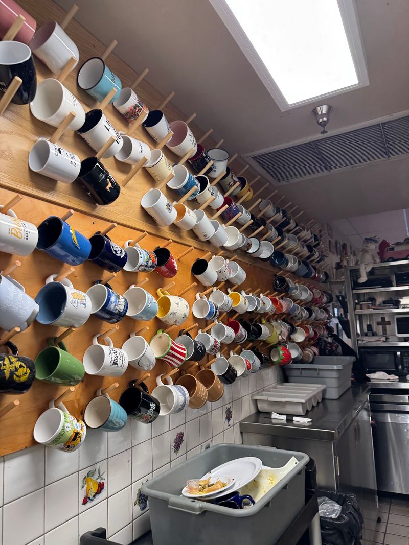 Vintage Decor And A Wall Covered In Mugs