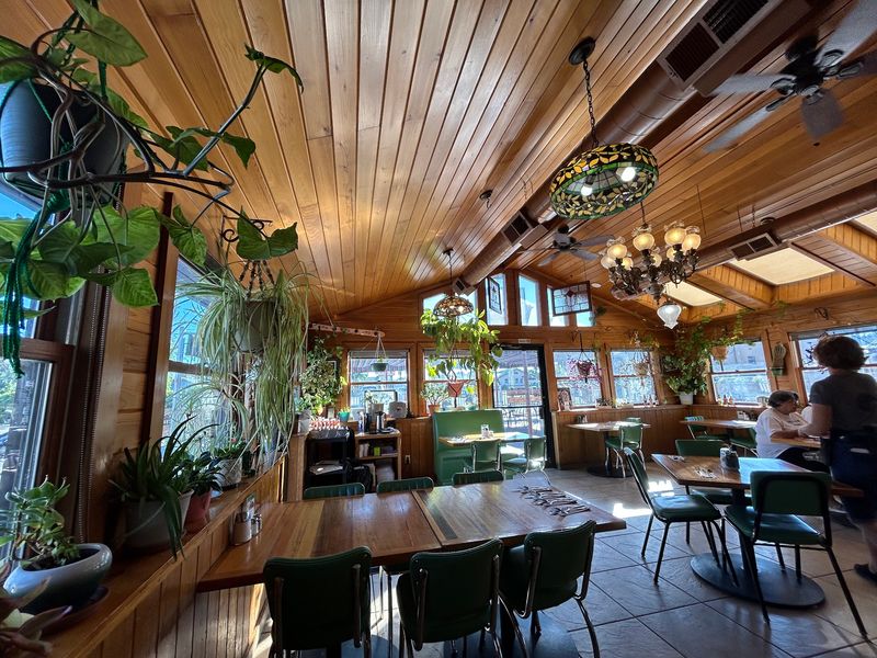 Counter Stools, Booths, And A Back Log Room