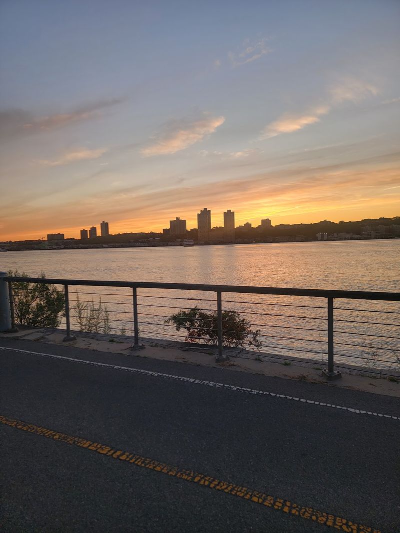 Skyline On One Side, River Other