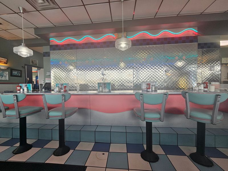 Burgers Under The All American Deluxe Banner