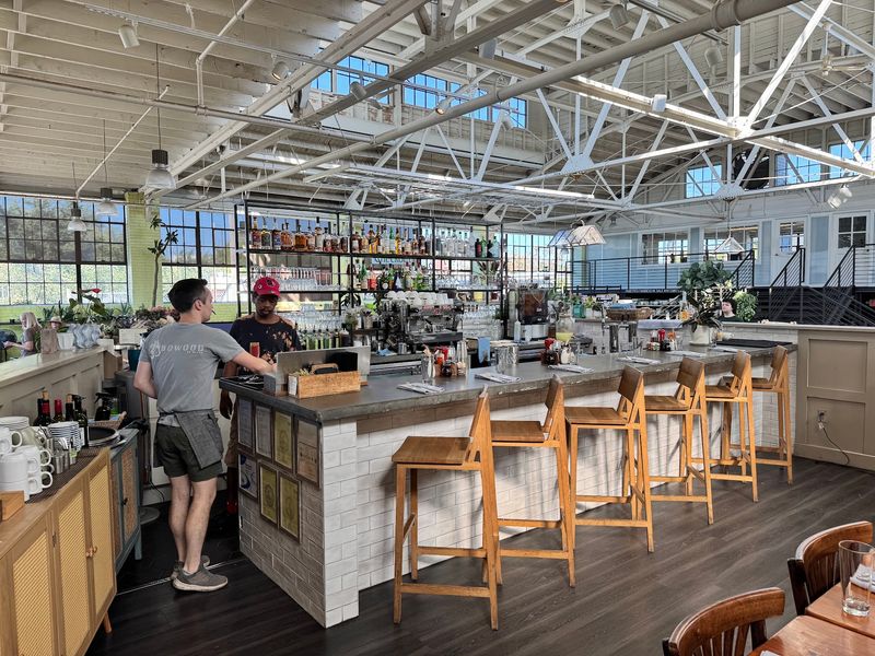 Bar Seats With A View Of The Plant Shop