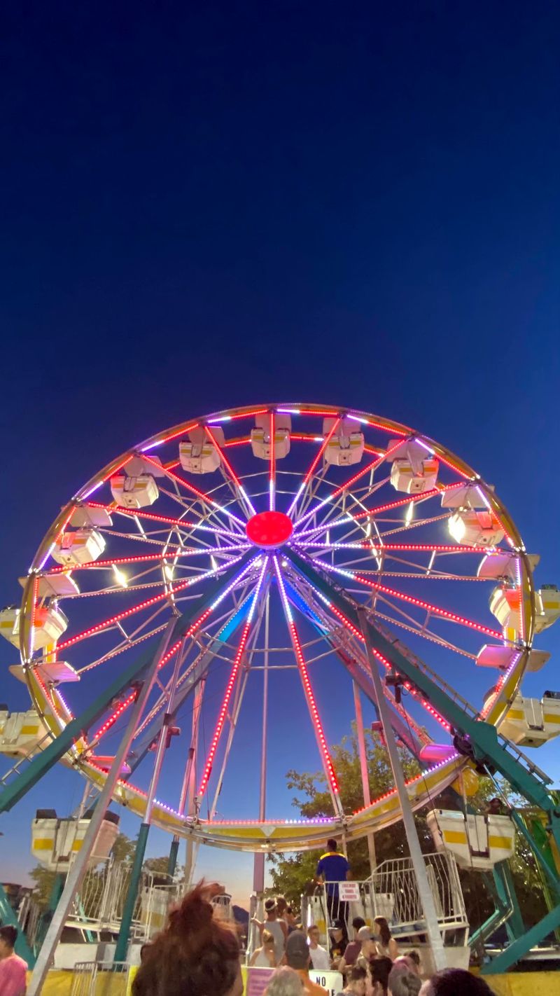 Thursday Night Lights Up The Carnival Midway