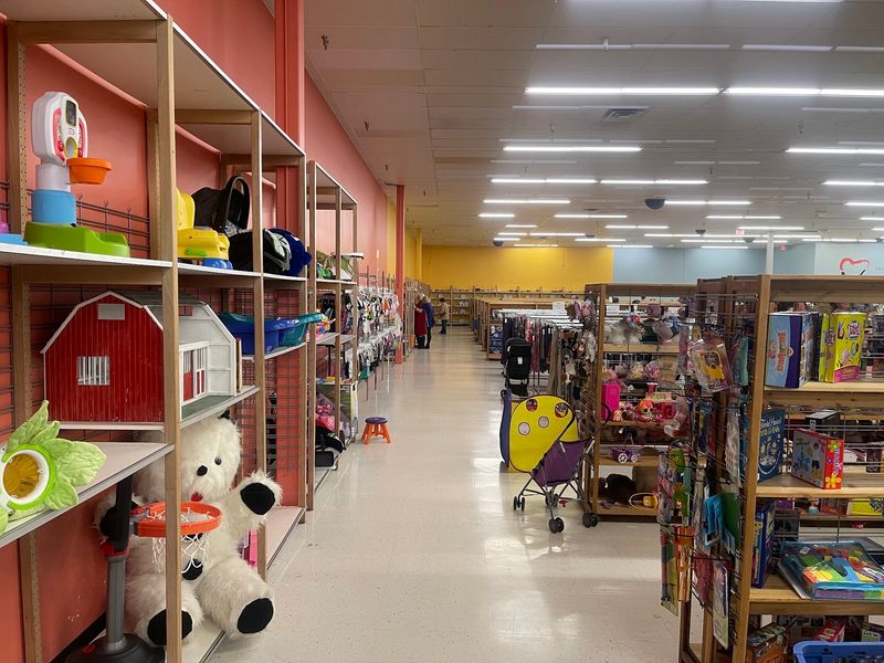 Backpacks, Lunch Boxes, And Gear Waiting On The Shelves