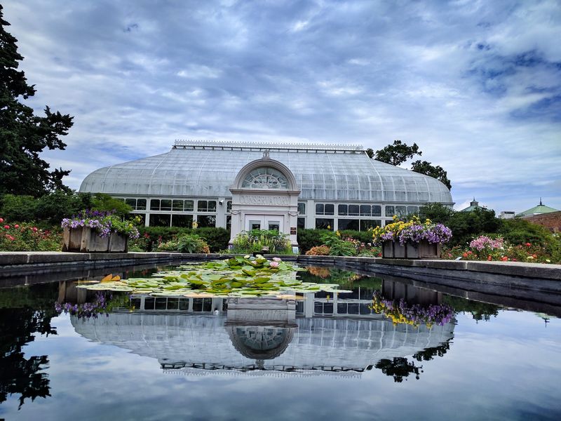 1930s Architecture Framed by Flower Beds