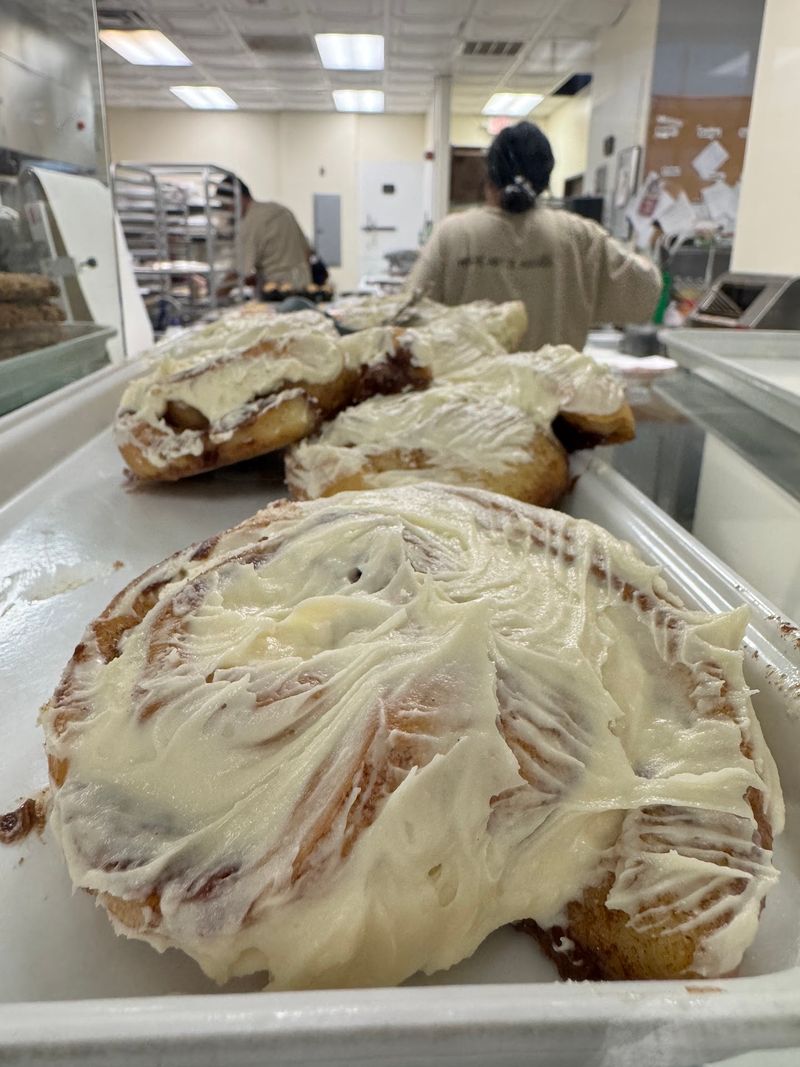 Cinnamon Rolls Under A Blanket Of Maple Frosting