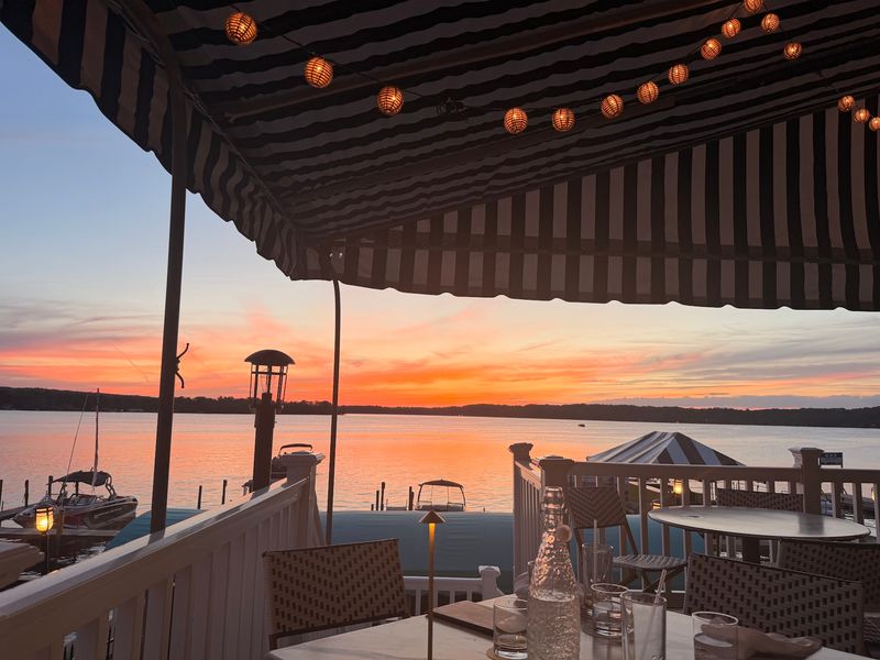 A Deck That Hovers Above The Lake
