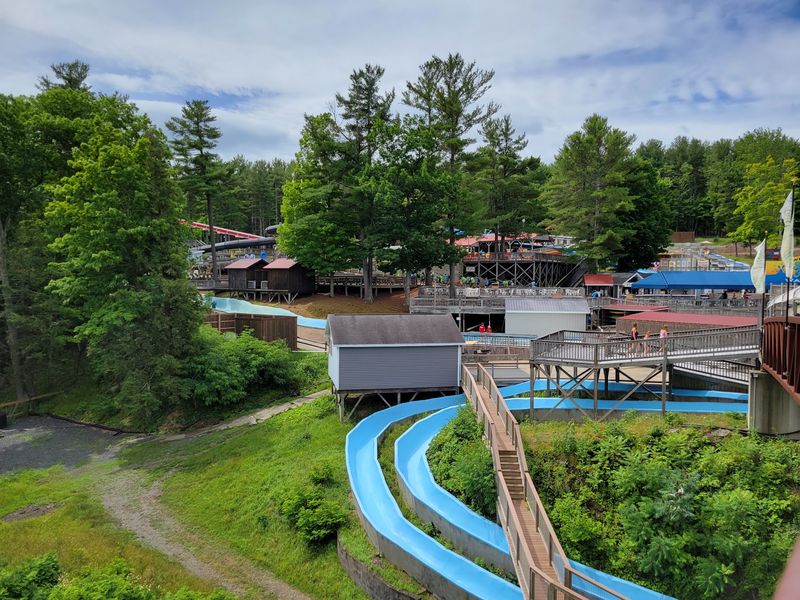 A Gorge With Waterslides Growing Out Of It