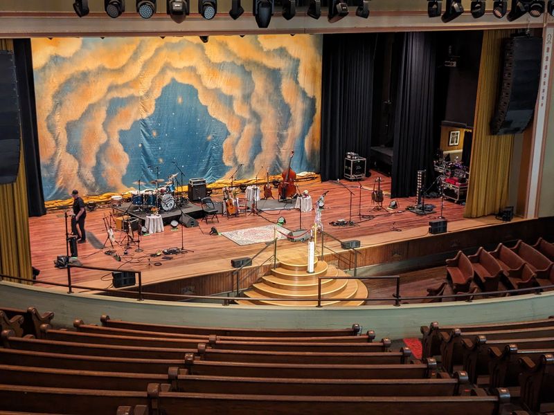 Standing On The Stage For A Photo That Costs Nothing Extra